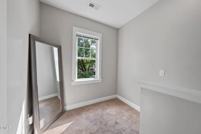 an empty room with a window