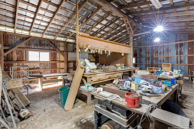 a outdoor space with lots of furniture and clutter