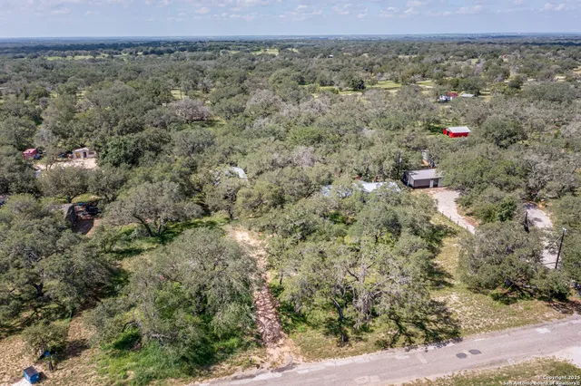 a view of a field with an outdoor space
