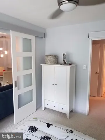a utility room with closet dryer and washer