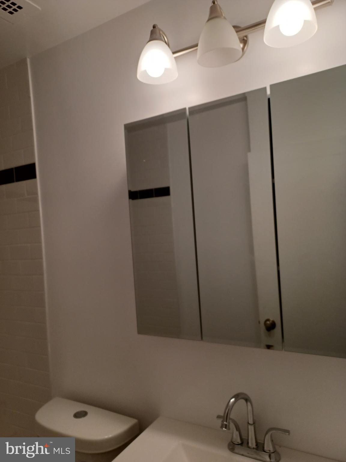 1425 4th Street Southwest, Unit M3 Washington, DC 20024 - Photo 15 of 22 a bathroom with a toilet and a sink