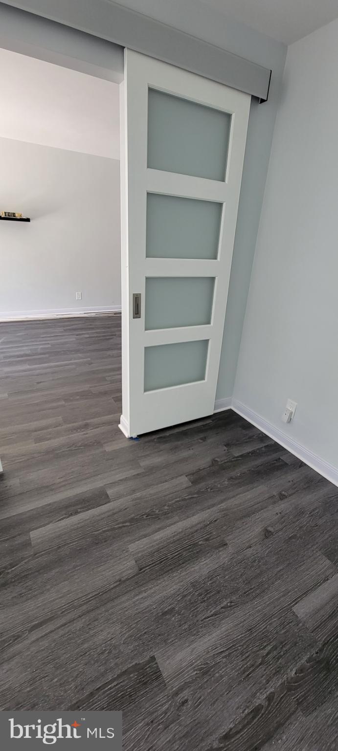1425 4th Street Southwest, Unit M3 Washington, DC 20024 - Photo 19 of 22 a view of a room with wooden floor