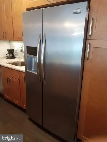 a kitchen with a stove and a microwave