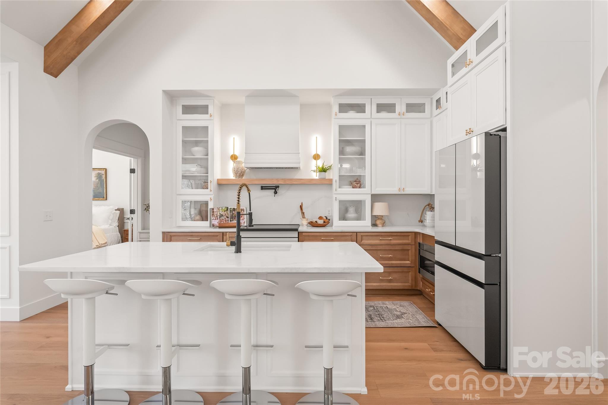 312 Rehobeth Road Waxhaw, NC 28173 - Photo 16 of 41 a kitchen with stainless steel appliances kitchen island granite countertop a refrigerator and a stove top oven