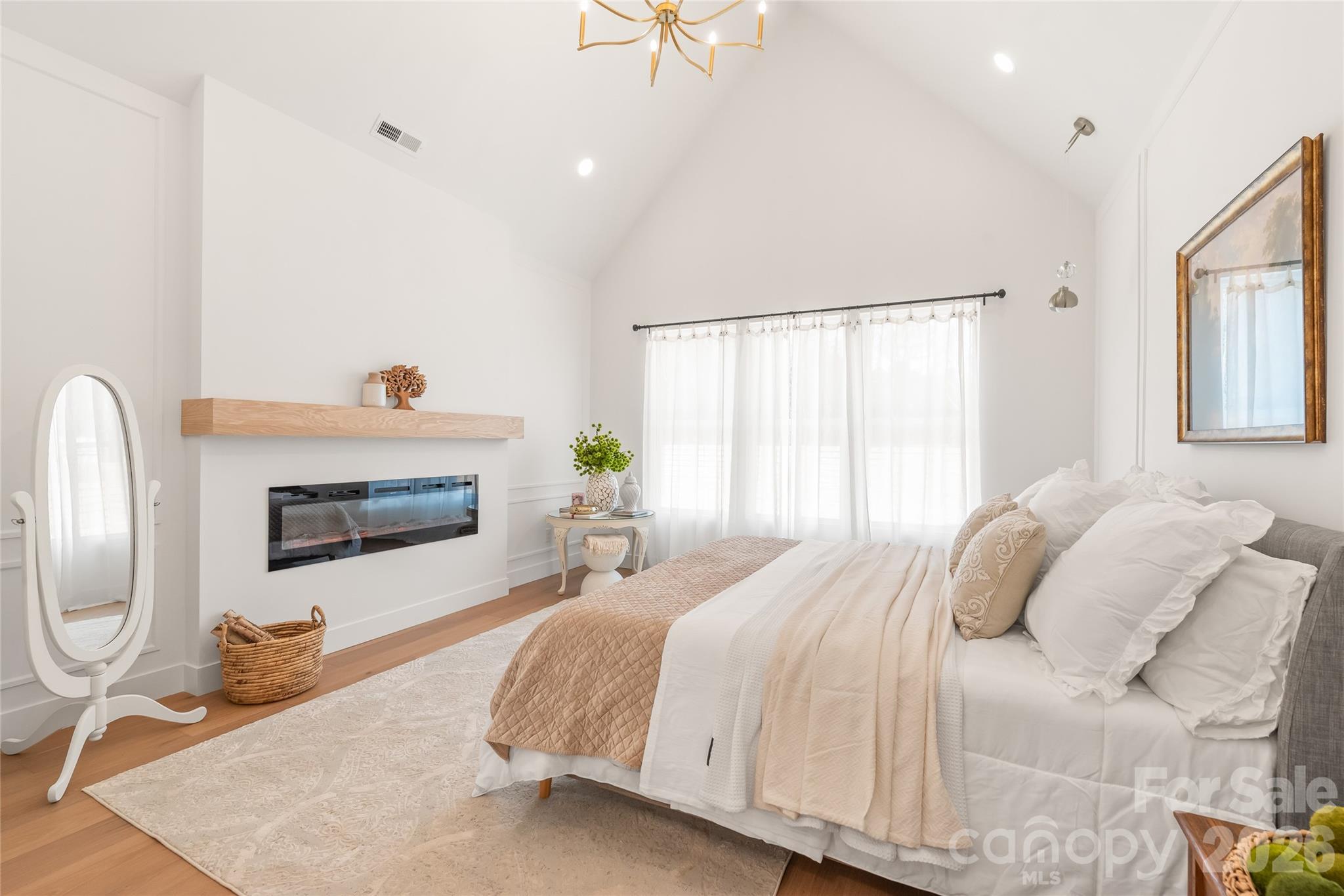 312 Rehobeth Road Waxhaw, NC 28173 - Photo 26 of 41 a bedroom with a bed and a fireplace