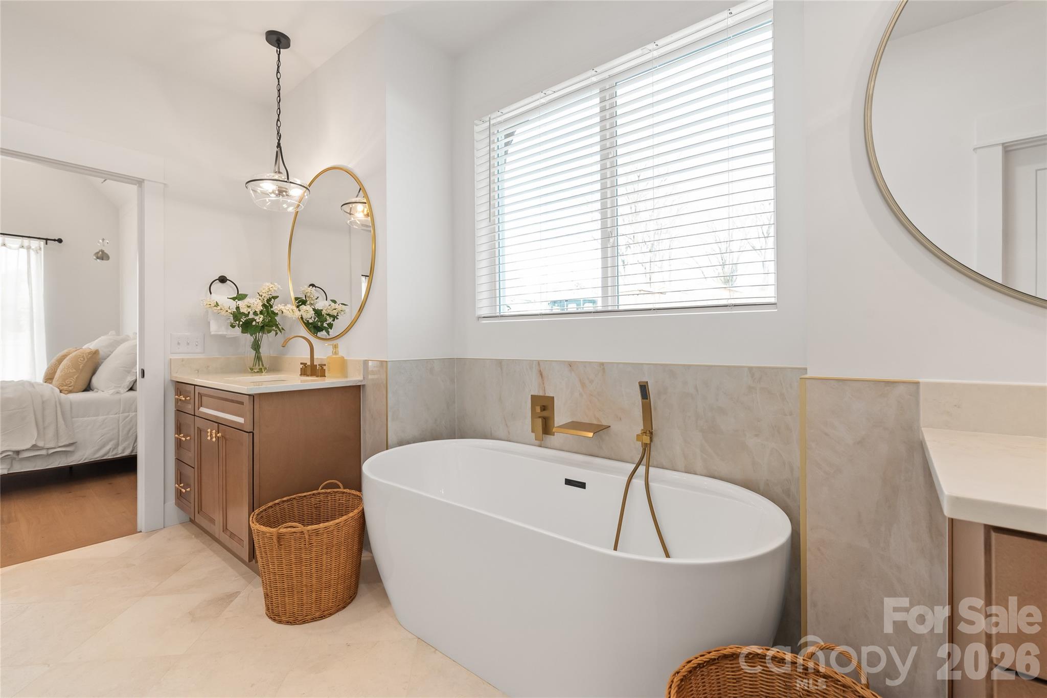 312 Rehobeth Road Waxhaw, NC 28173 - Photo 30 of 41 a living room with furniture a window and a chandelier