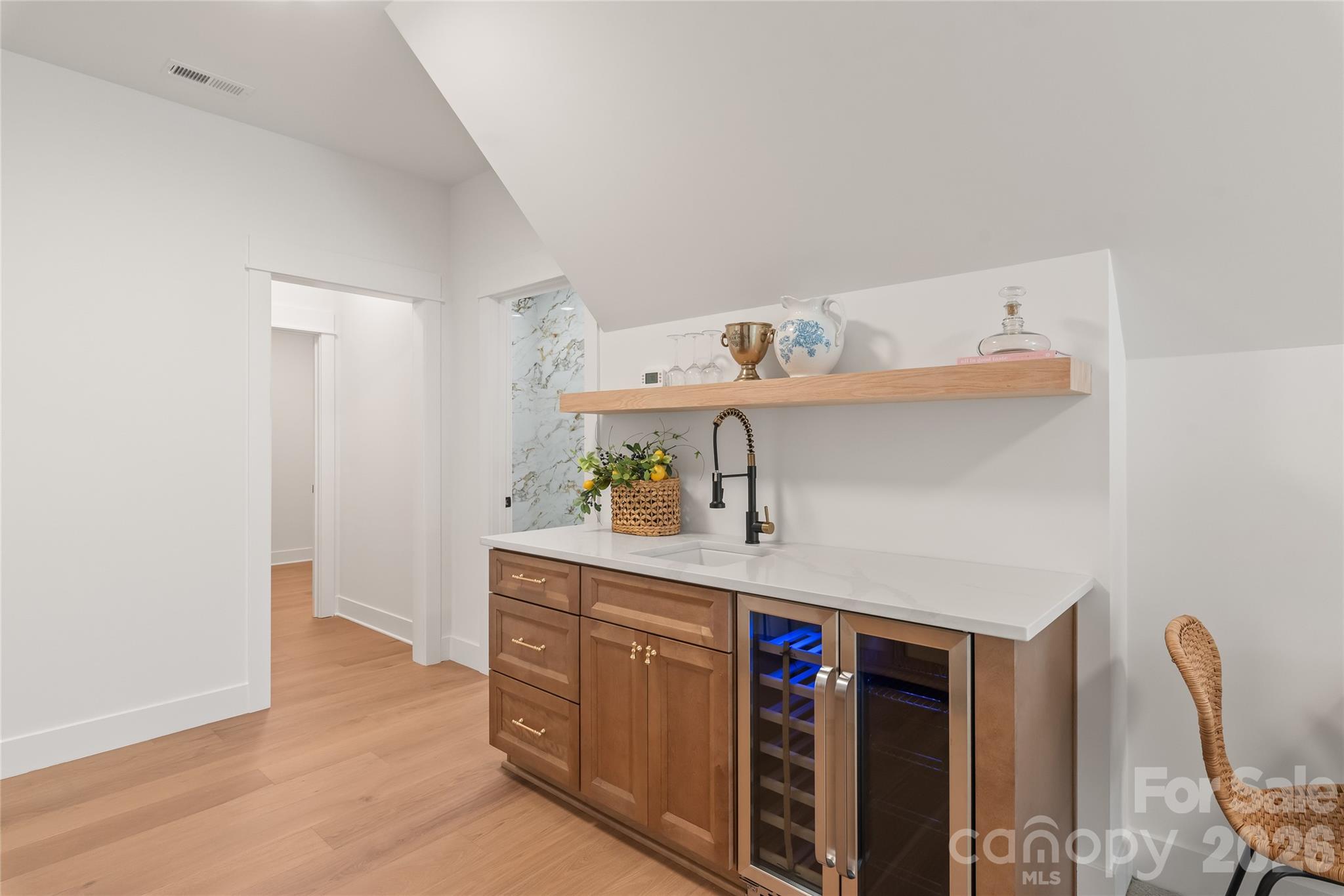 312 Rehobeth Road Waxhaw, NC 28173 - Photo 32 of 41 a kitchen with stainless steel appliances a sink and cabinets