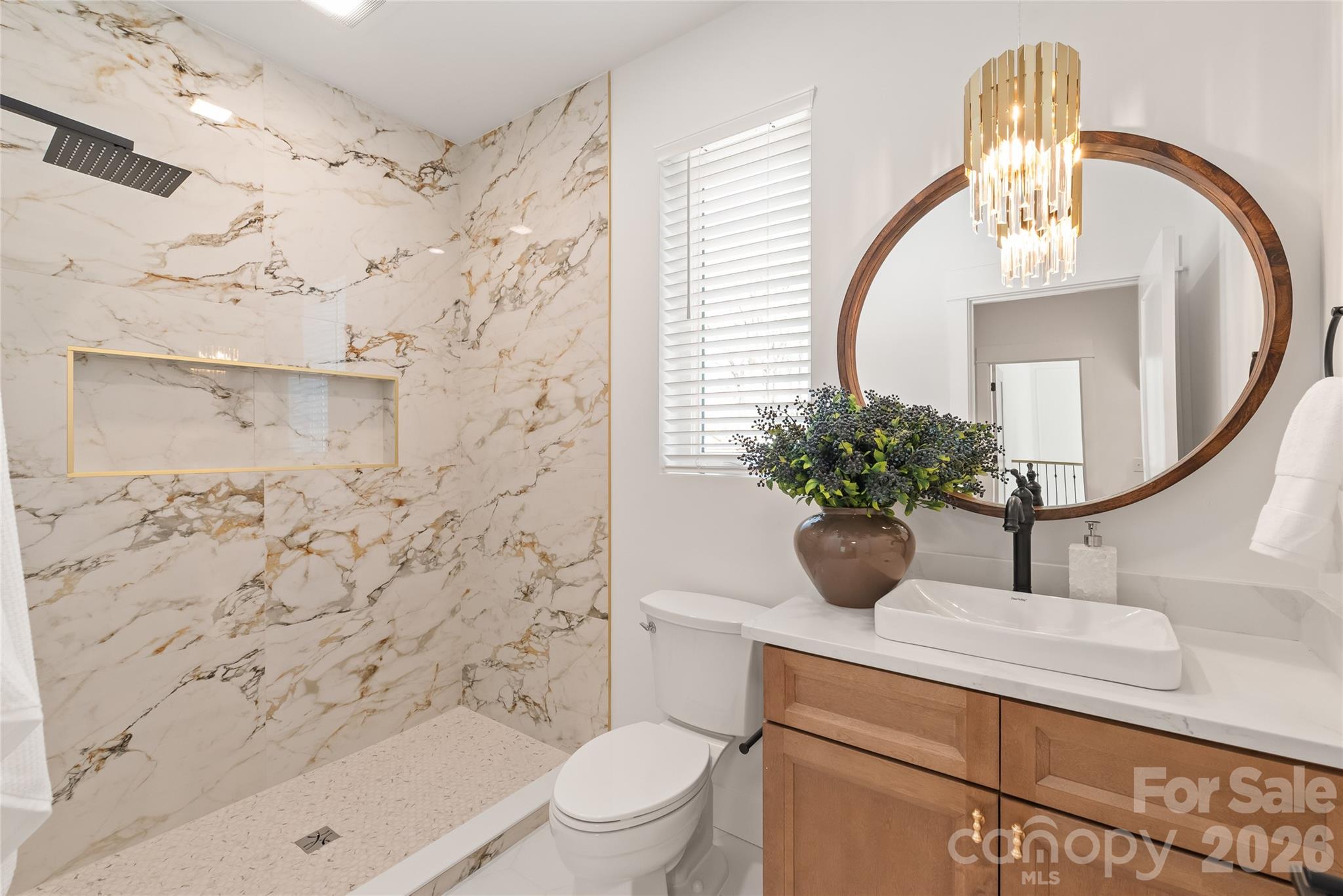 312 Rehobeth Road Waxhaw, NC 28173 - Photo 33 of 41 a bathroom with a sink a toilet and shower