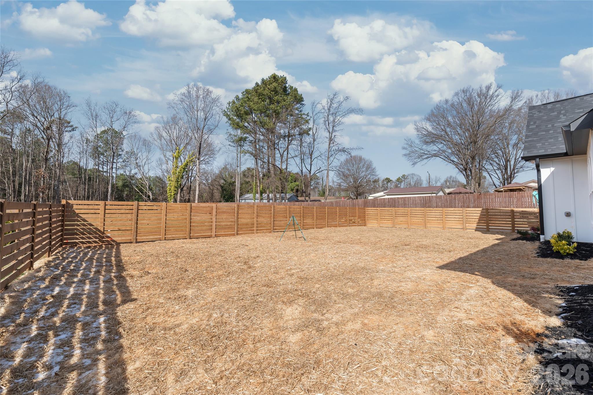 312 Rehobeth Road Waxhaw, NC 28173 - Photo 41 of 41 a view of yard with swimming pool and trees in the background