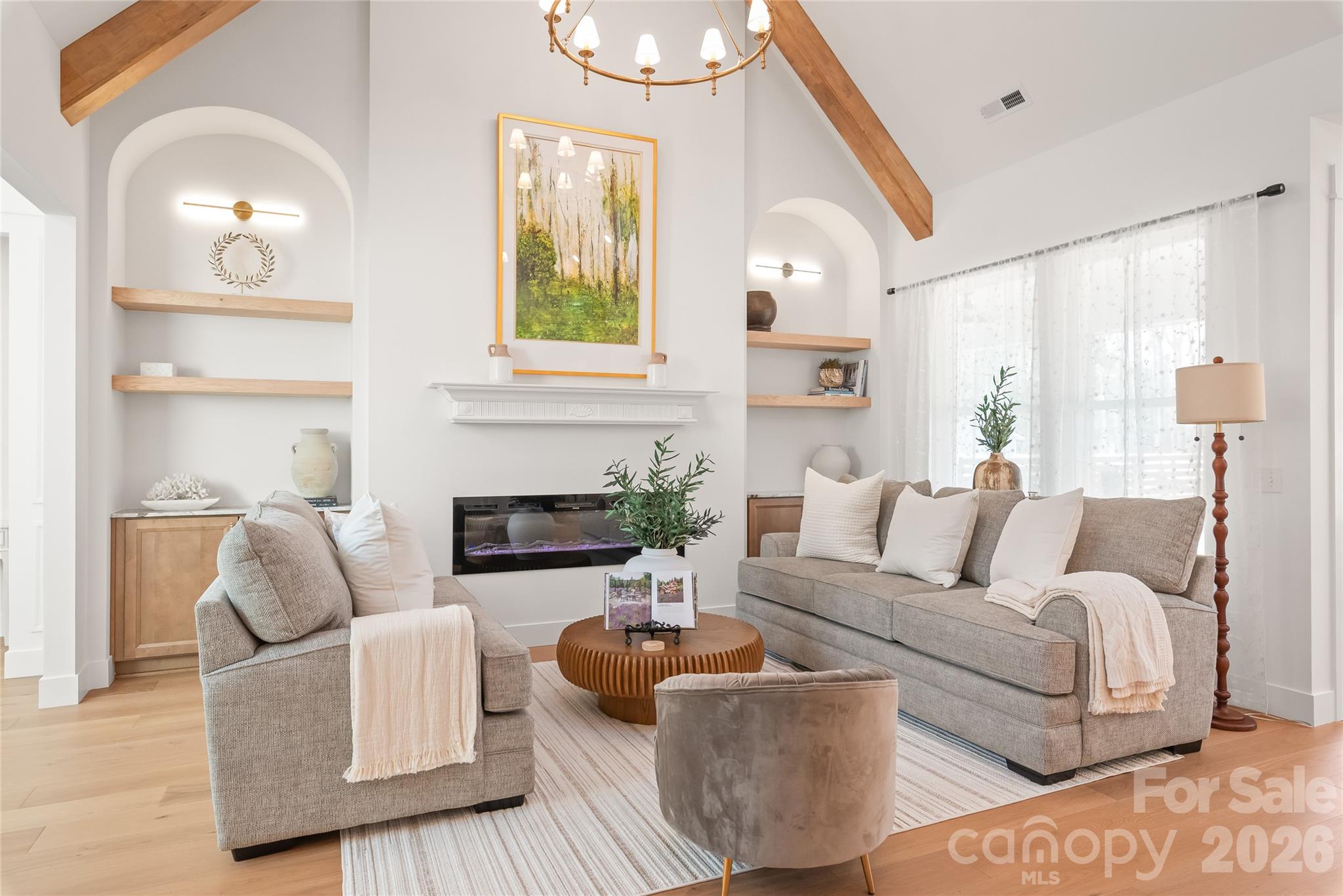 312 Rehobeth Road Waxhaw, NC 28173 - Photo 9 of 41 a living room with furniture and a fireplace