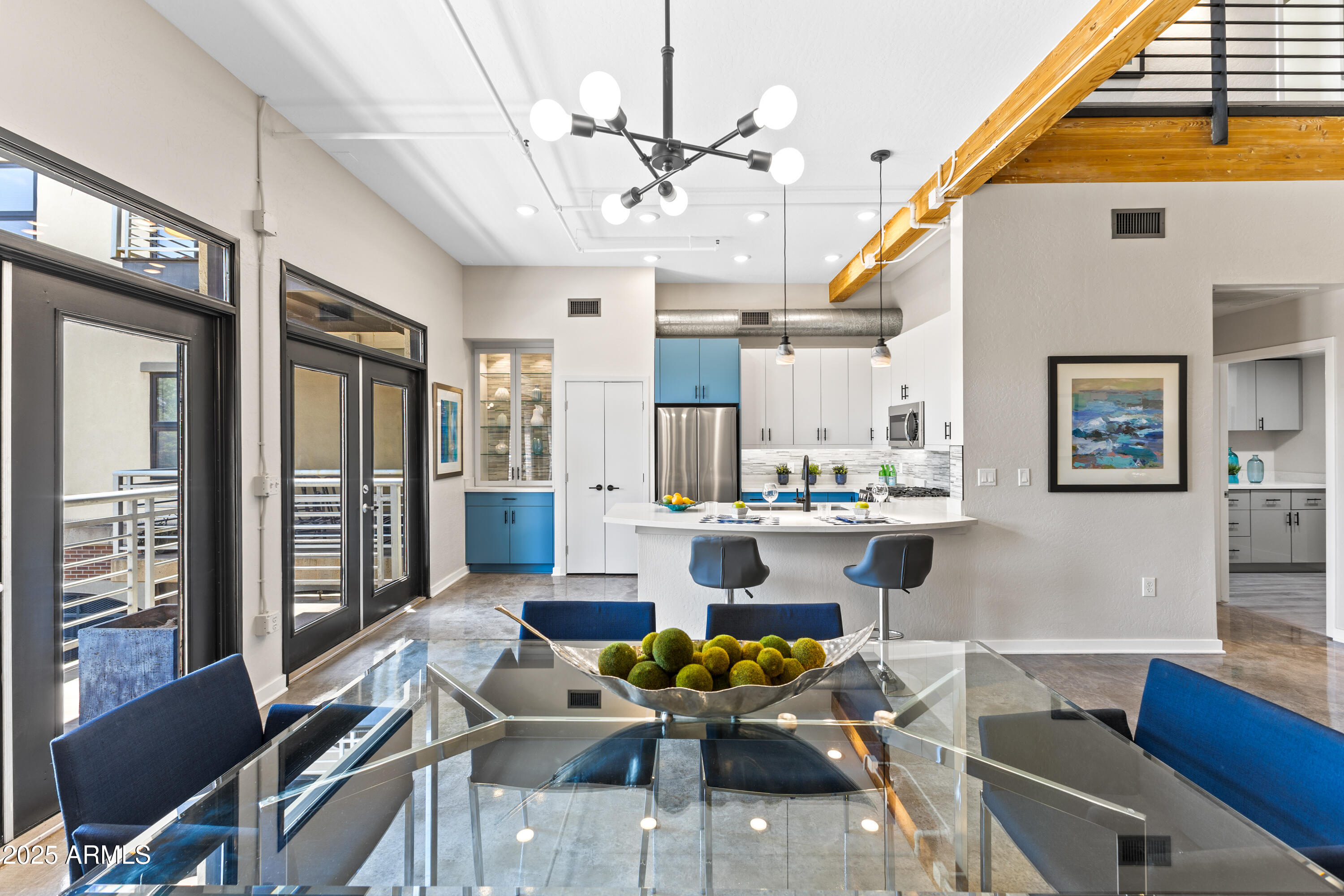 914 East Osborn Road, Unit 208 Phoenix, AZ 85014 - Photo 14 of 53 a living room with fireplace furniture and a dining table