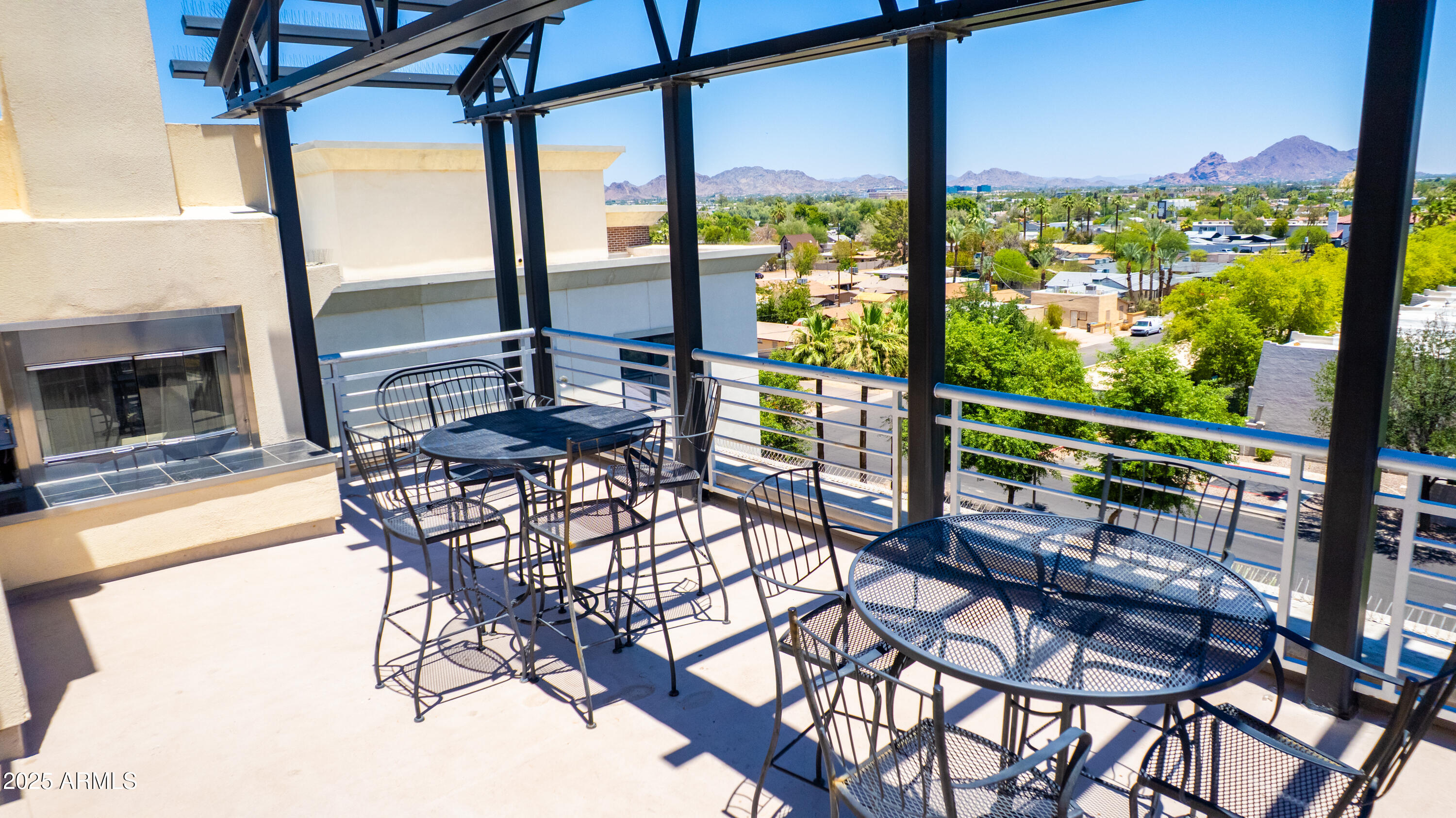 914 East Osborn Road, Unit 208 Phoenix, AZ 85014 - Photo 46 of 53 a view of a balcony with chairs