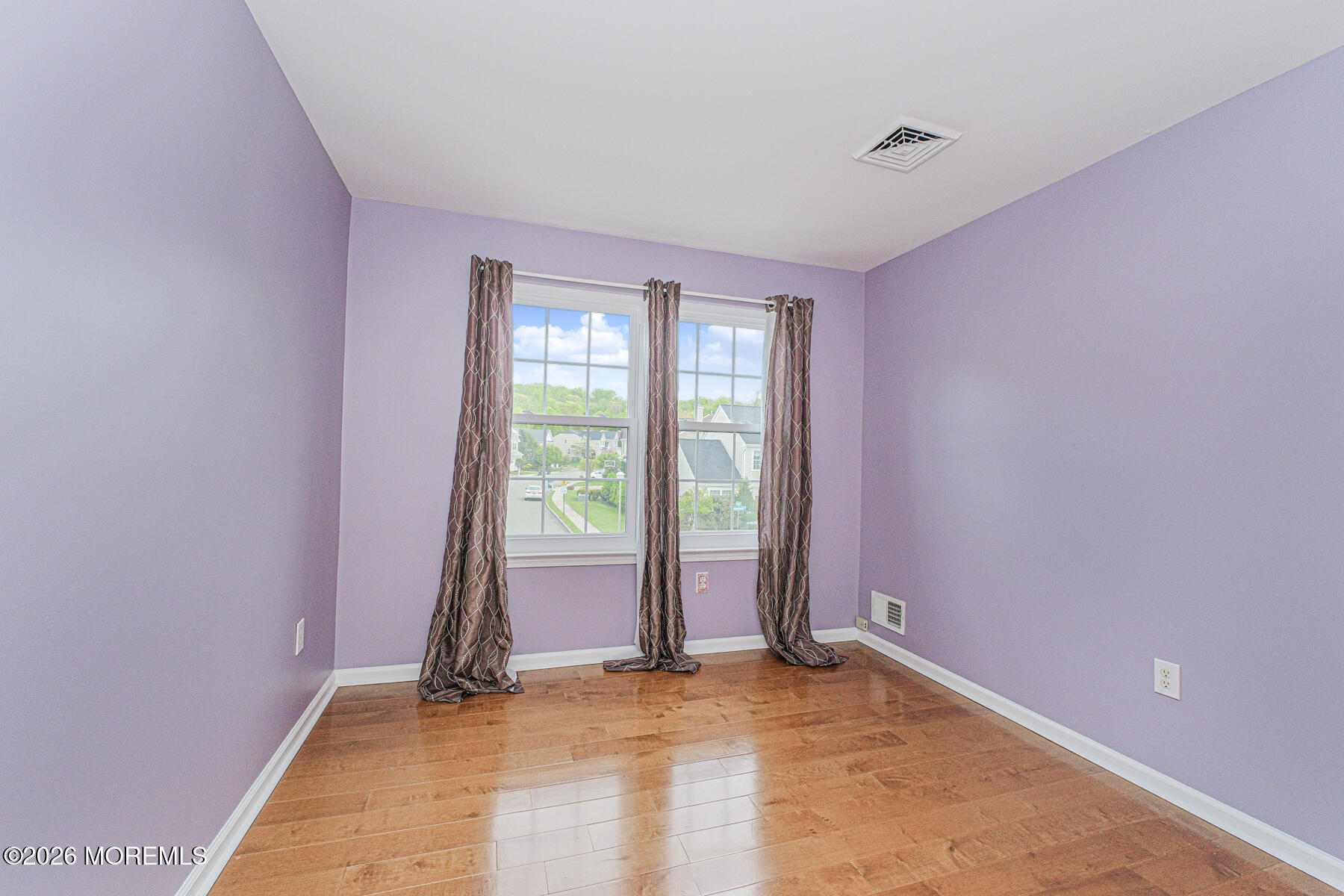 315 Wedgewood Road Morganville, NJ 07751 - Photo 25 of 37 a view of an empty room with a window