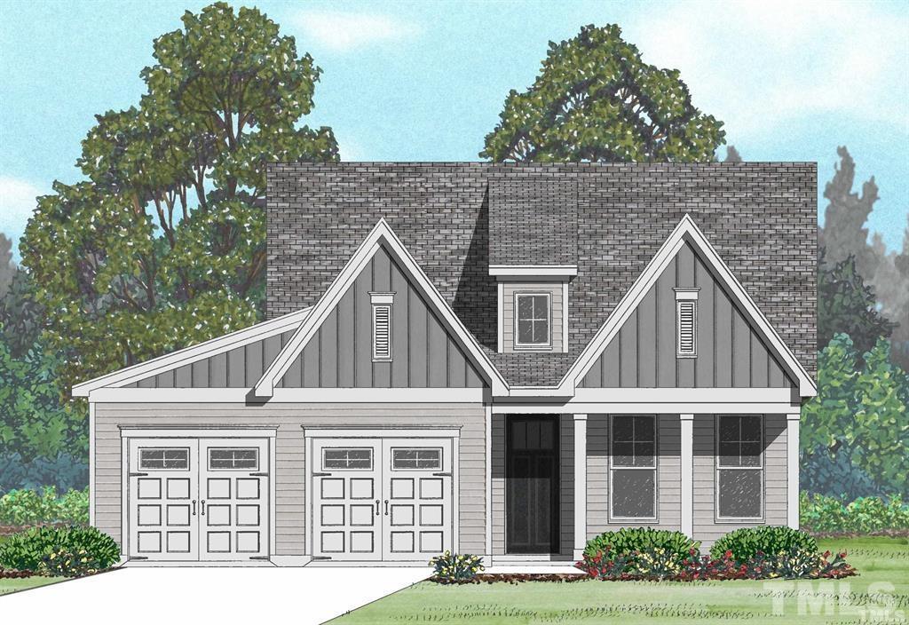 41 Mae Court Roxboro, NC 27573 - Photo 1 of 4 front view of a house with a garden