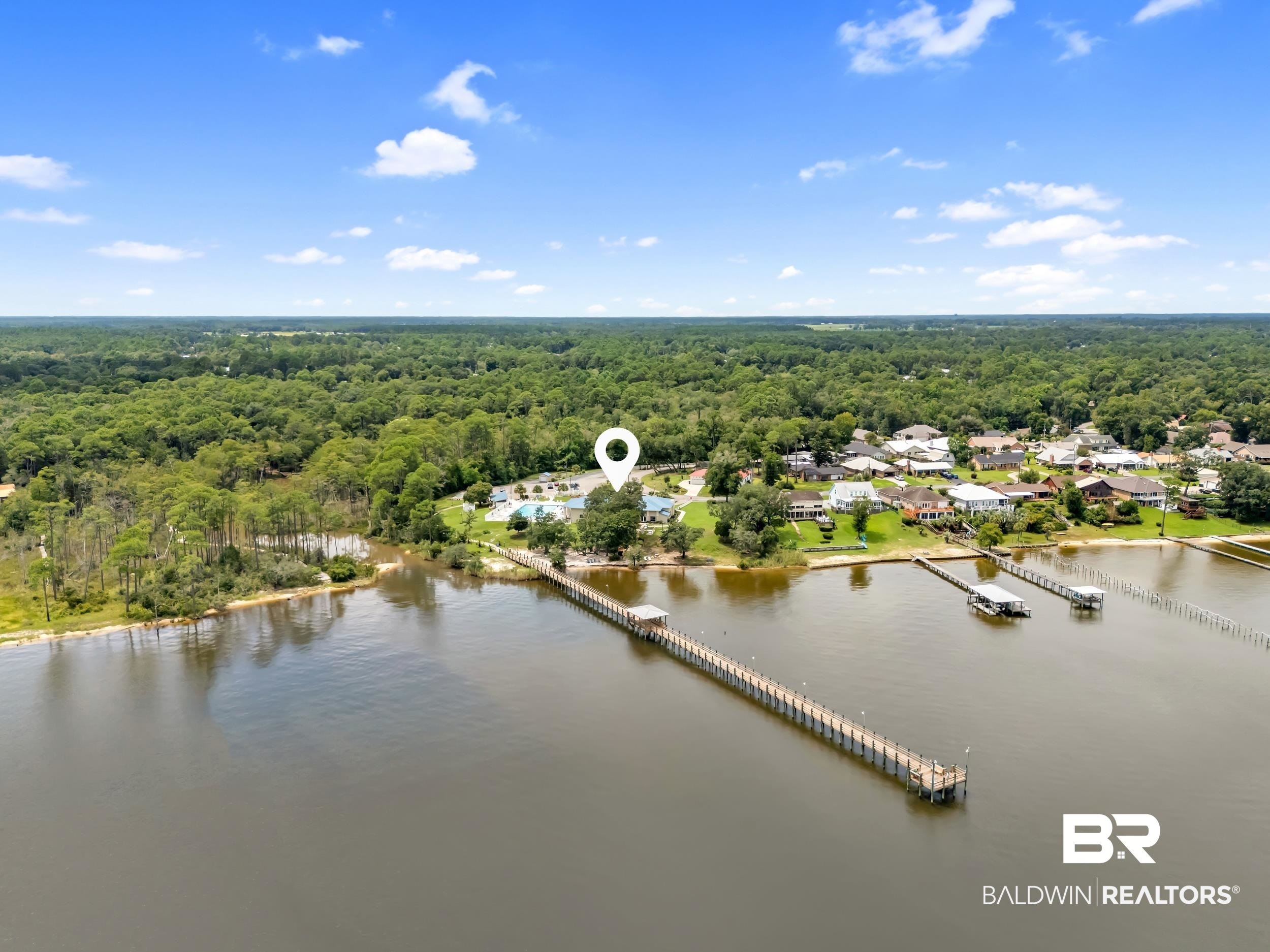 182 Defuniak Loop Lillian, AL 36549 - Photo 18 of 21 Drone / aerial view of a nearby body of water