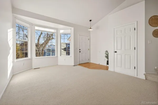 a view of empty room with a window