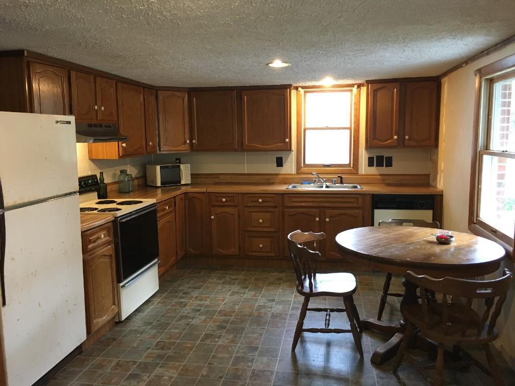 76 Lombard Road Arundel, ME 04046 - Photo 2 of 7 Kitchen and eat in area.