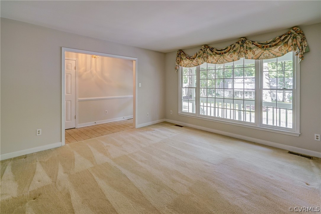 3909 Cheyenne Road Richmond, VA 23235 - Photo 13 of 47 a view of an empty room with a window
