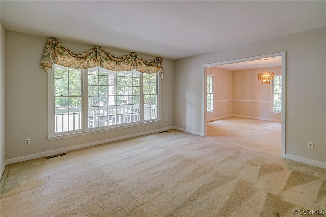 3909 Cheyenne Road Richmond, VA 23235 - Photo 14 of 47 a view of an empty room with a window