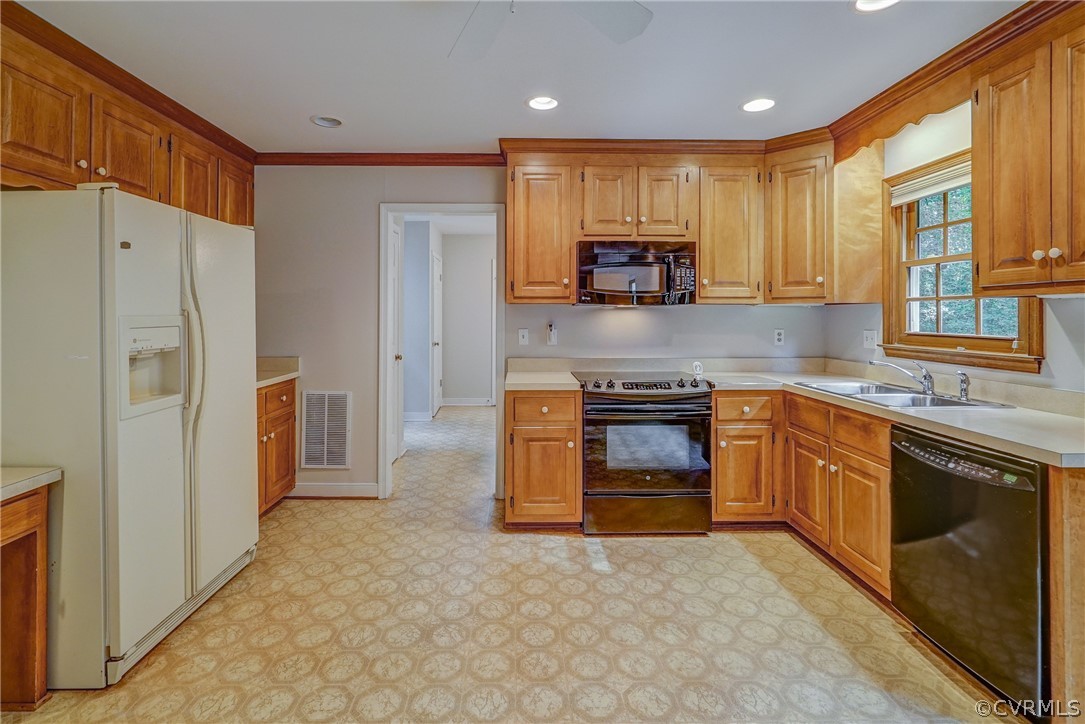 3909 Cheyenne Road Richmond, VA 23235 - Photo 20 of 47 a kitchen with stainless steel appliances granite countertop a refrigerator stove microwave and sink