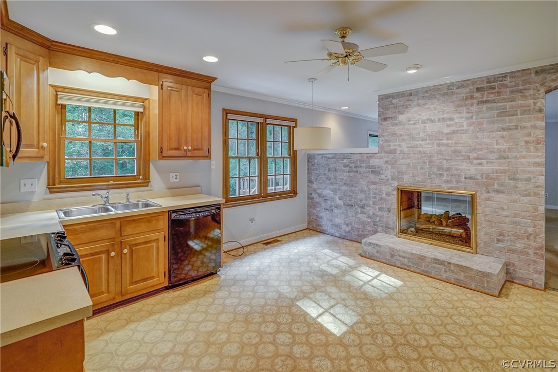 3909 Cheyenne Road Richmond, VA 23235 - Photo 22 of 47 a open kitchen with granite countertop a stove top oven sink and cabinets