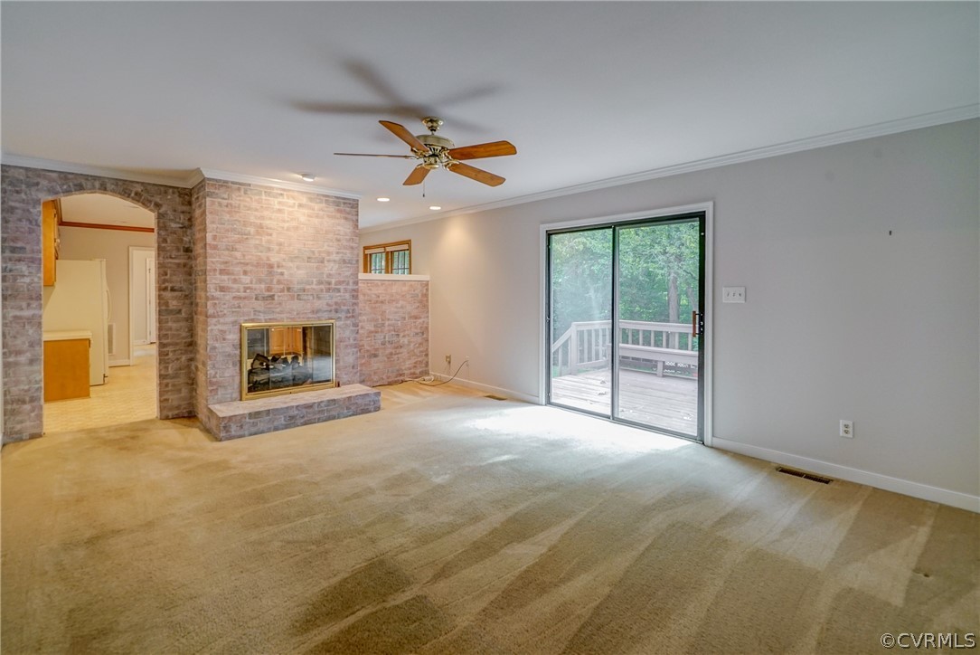 3909 Cheyenne Road Richmond, VA 23235 - Photo 27 of 47 a view of empty room with fireplace and a window
