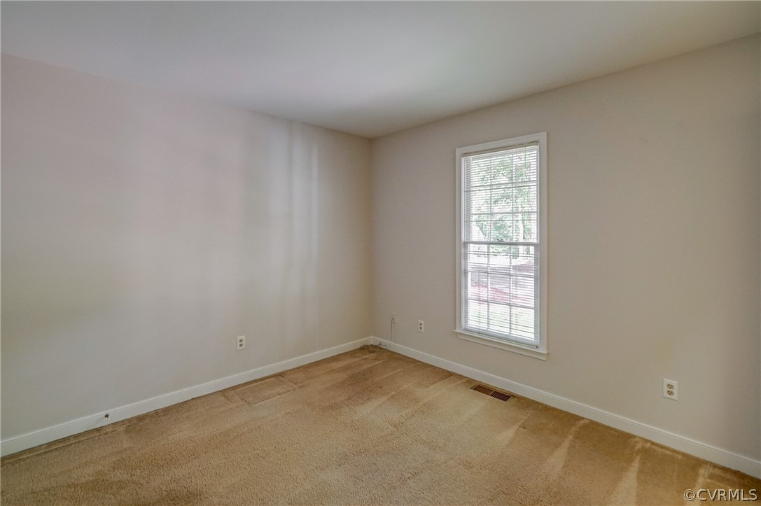 3909 Cheyenne Road Richmond, VA 23235 - Photo 33 of 47 an empty room with a window