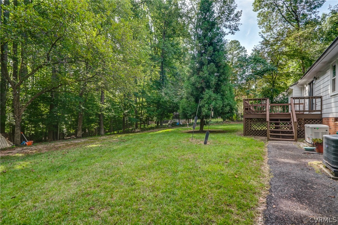 3909 Cheyenne Road Richmond, VA 23235 - Photo 44 of 47 a view of a park with swings and a trees