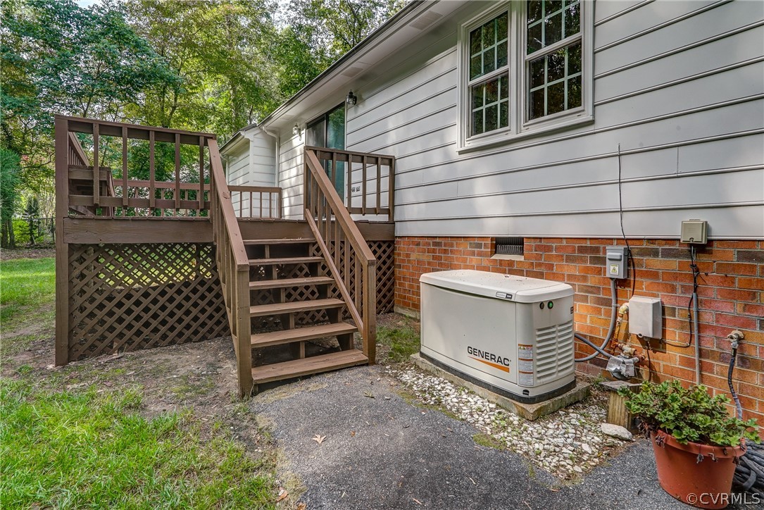 3909 Cheyenne Road Richmond, VA 23235 - Photo 45 of 47 a view of a house with backyard and deck