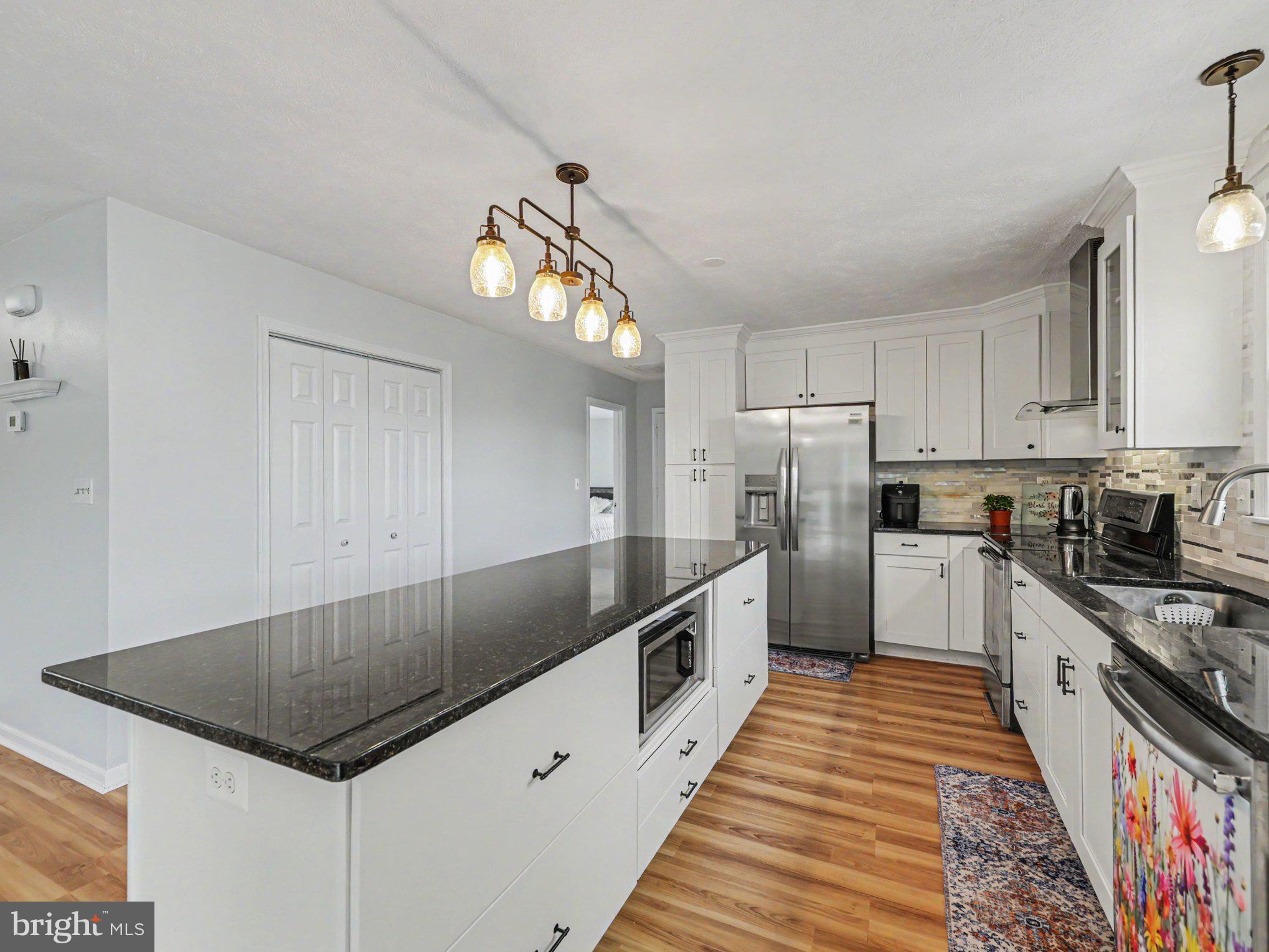 34340 Parker Road Locust Grove, VA 22508 - Photo 10 of 27 Modern kitchen with sleek finishes.