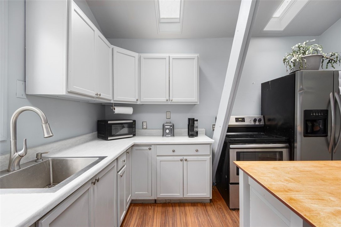 27 Ricks Road Charlestown, RI 02813 - Photo 7 of 38 Kitchen skylights for more natural light