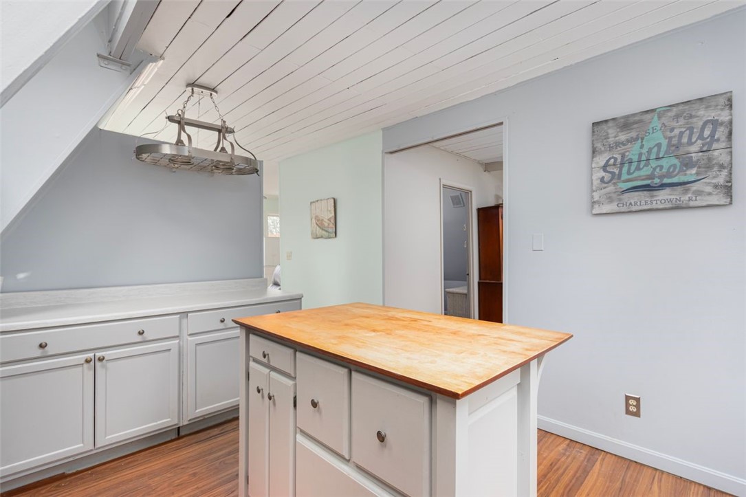 27 Ricks Road Charlestown, RI 02813 - Photo 8 of 38 Kitchen looking towards dining room and living room
