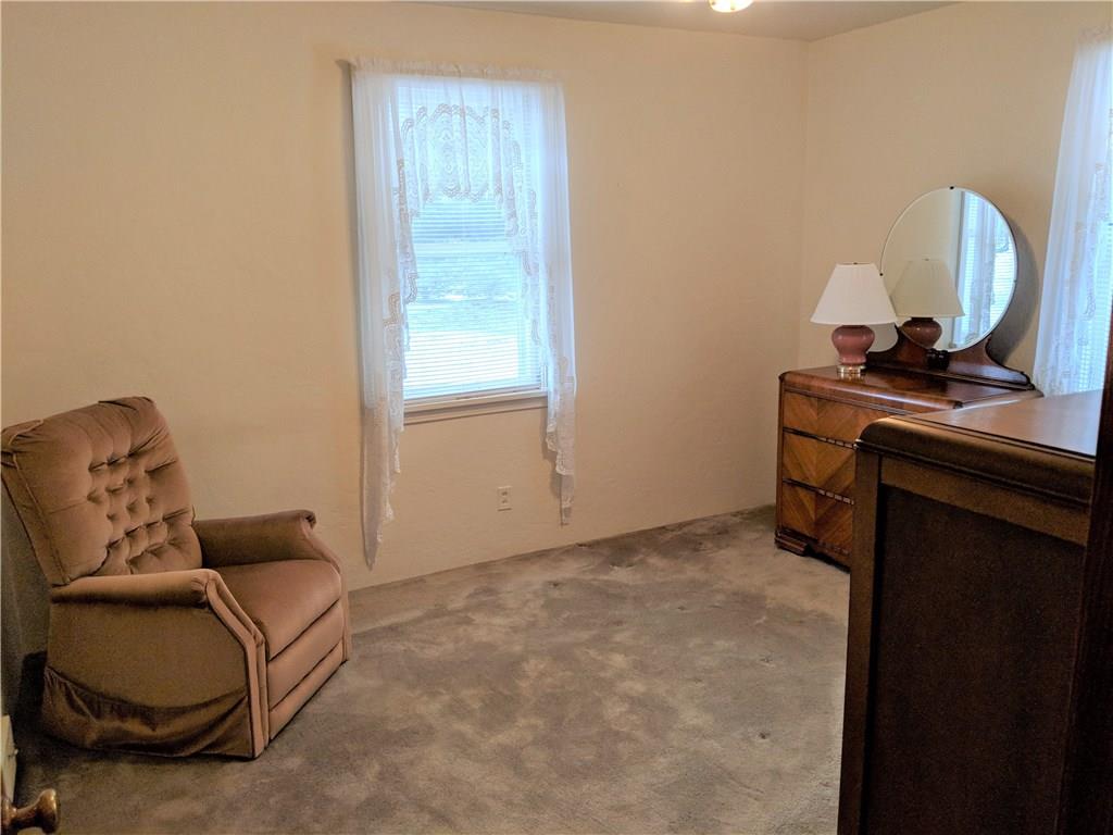 205 Montgomery Road Scottdale, PA 15683 - Photo 12 of 25 main floor bedroom with large closet and views of the outdoors