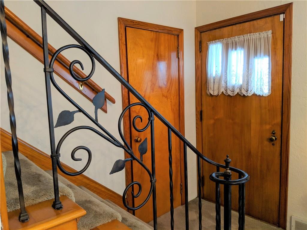 205 Montgomery Road Scottdale, PA 15683 - Photo 16 of 25 front entry, decorative wrought iron railing