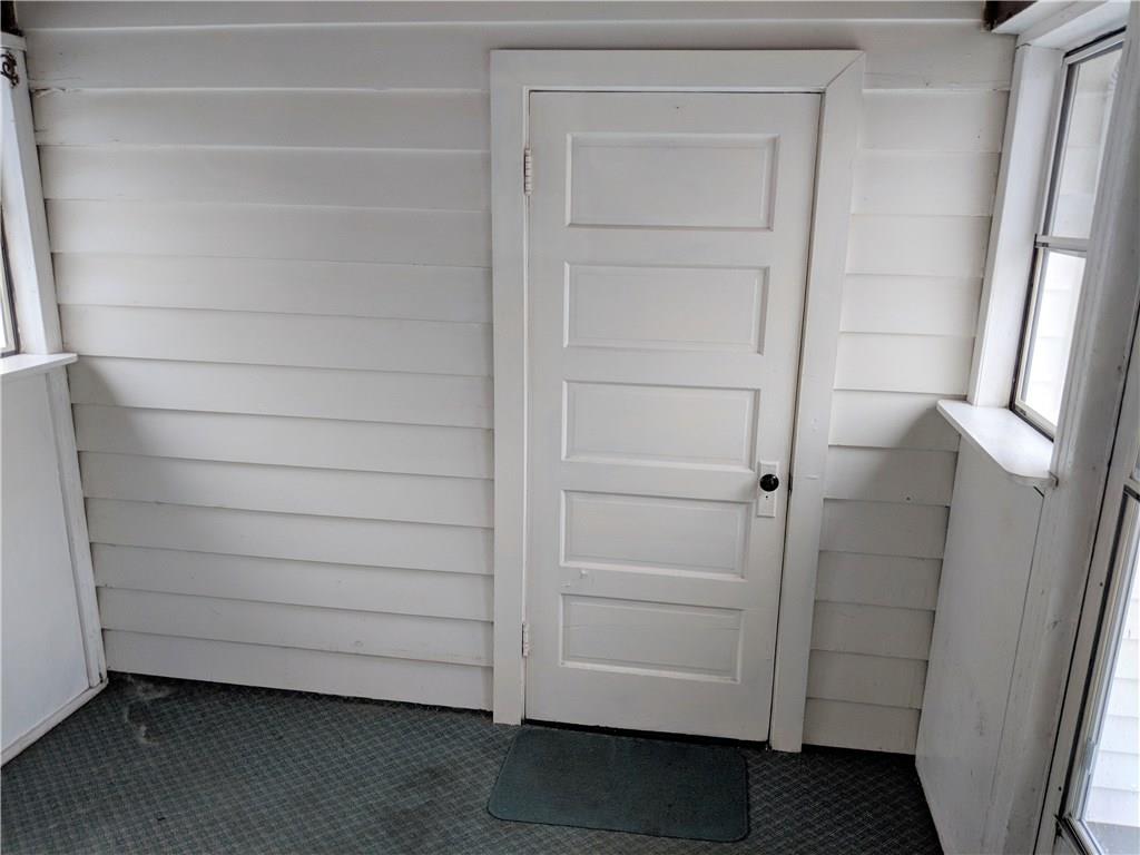 205 Montgomery Road Scottdale, PA 15683 - Photo 24 of 25 Enclosed mudroom, entry to attached garage and rear patio