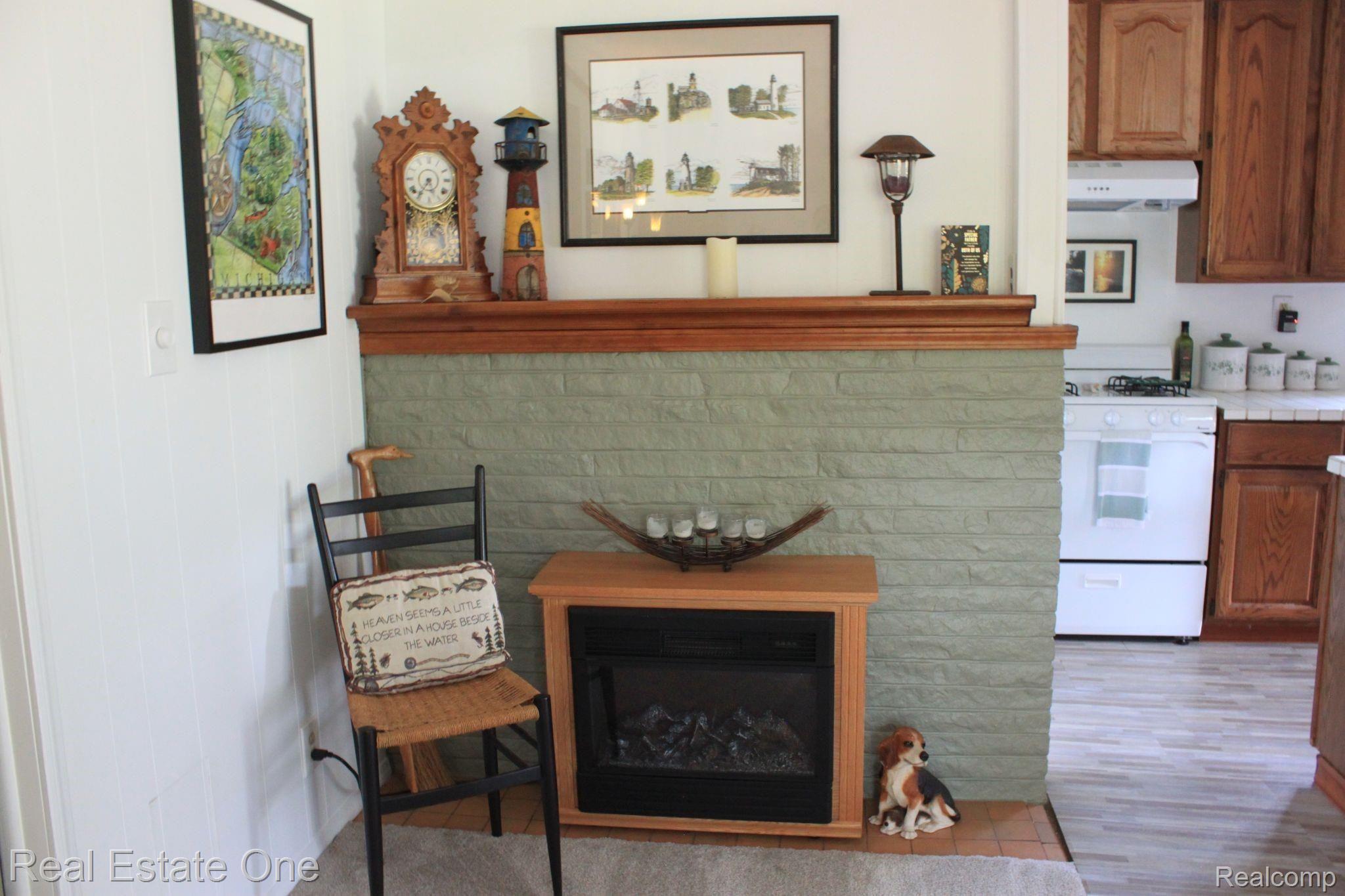 5475 North Cedar River Road Gladwin, MI 48624 - Photo 10 of 64 fireplace.JPG