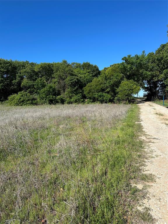 2247 Highway 2247 Comanche, TX 76442 - Photo 2 of 10 a view of an ocean with a mountain in the background