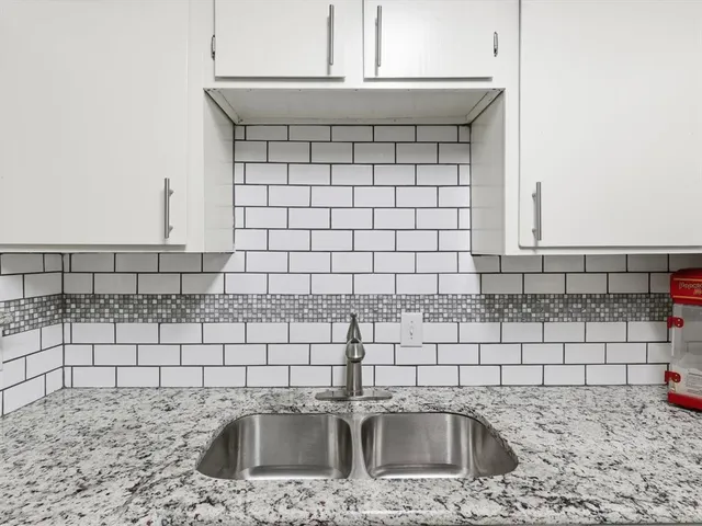 a sink a mirror and a sink