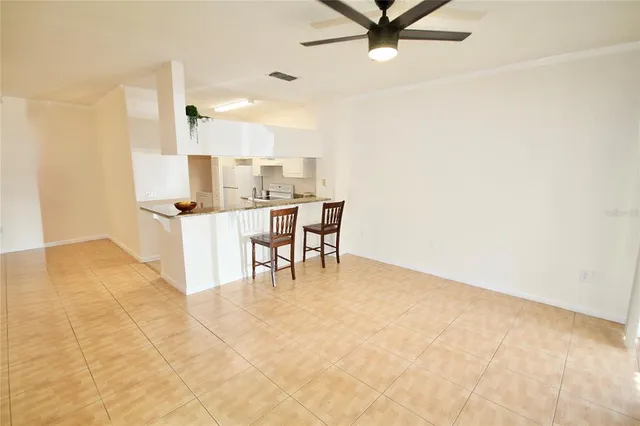 a kitchen with a sink cabinets and window