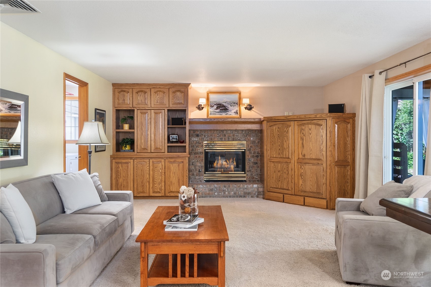 2540 Walnut Loop Northwest Olympia, WA 98502 - Photo 15 of 30 a living room with furniture and a fireplace