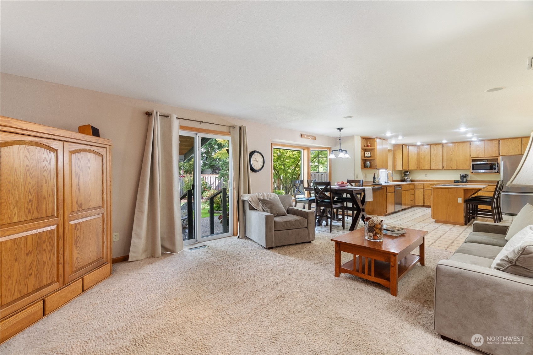 2540 Walnut Loop Northwest Olympia, WA 98502 - Photo 16 of 30 a living room with furniture and a table