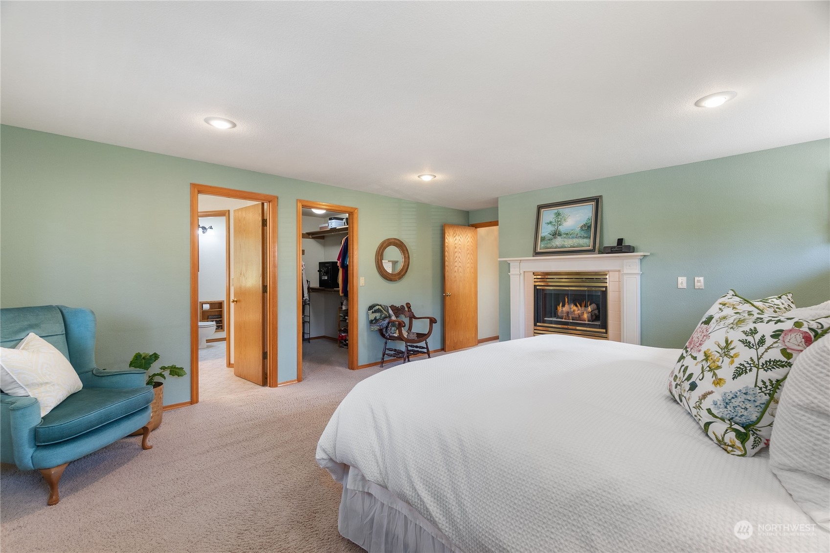 2540 Walnut Loop Northwest Olympia, WA 98502 - Photo 20 of 30 a spacious bedroom with a bed and glass top table