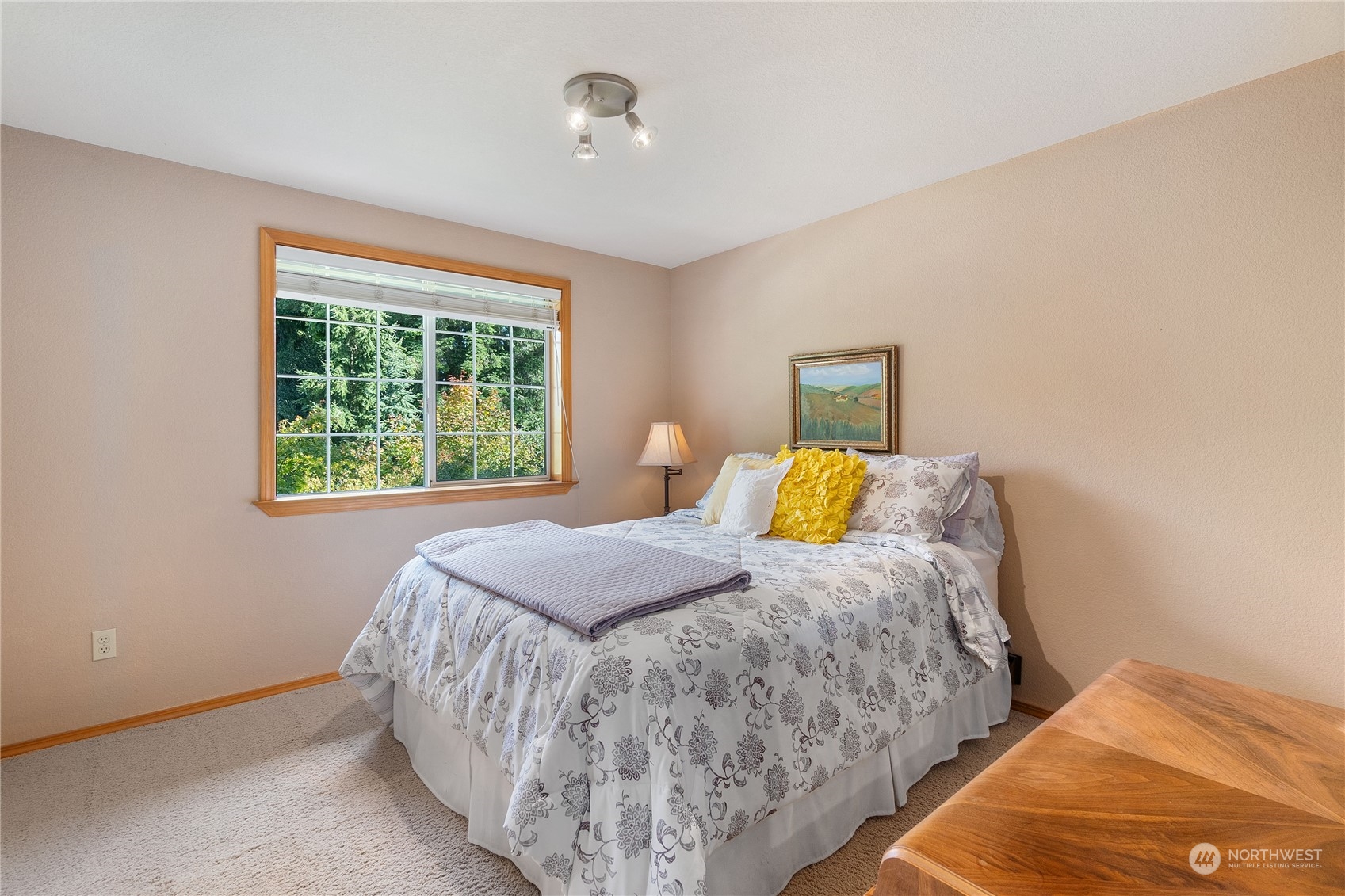 2540 Walnut Loop Northwest Olympia, WA 98502 - Photo 24 of 30 a bedroom with a bed and window
