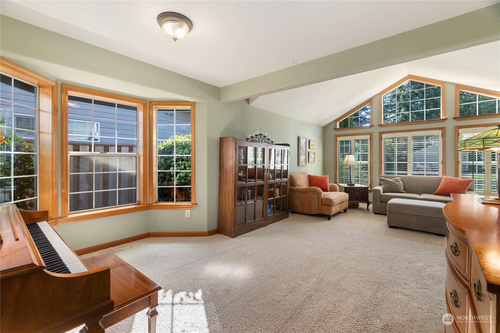 2540 Walnut Loop Northwest Olympia, WA 98502 - Photo 6 of 30 a living room with furniture and large windows