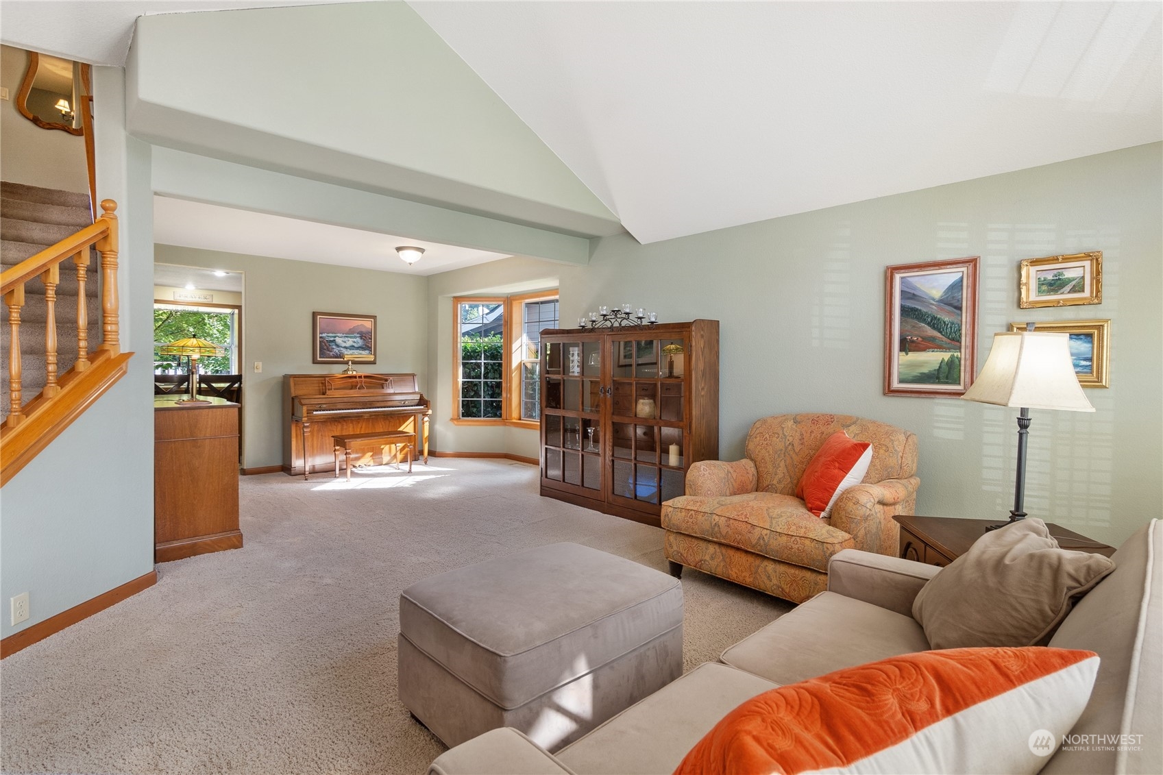 2540 Walnut Loop Northwest Olympia, WA 98502 - Photo 7 of 30 a living room with furniture and a flat screen tv
