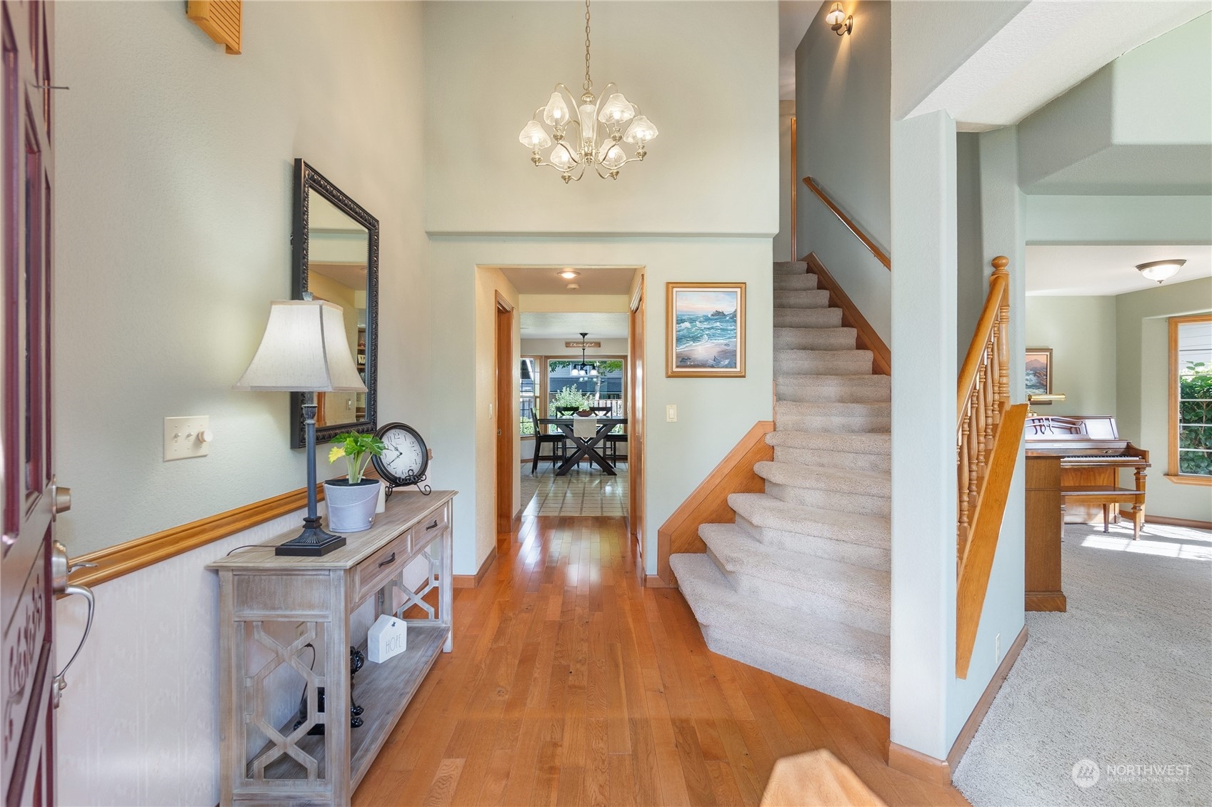 2540 Walnut Loop Northwest Olympia, WA 98502 - Photo 8 of 30 a view of a livingroom with furniture wooden floor and a chandelier