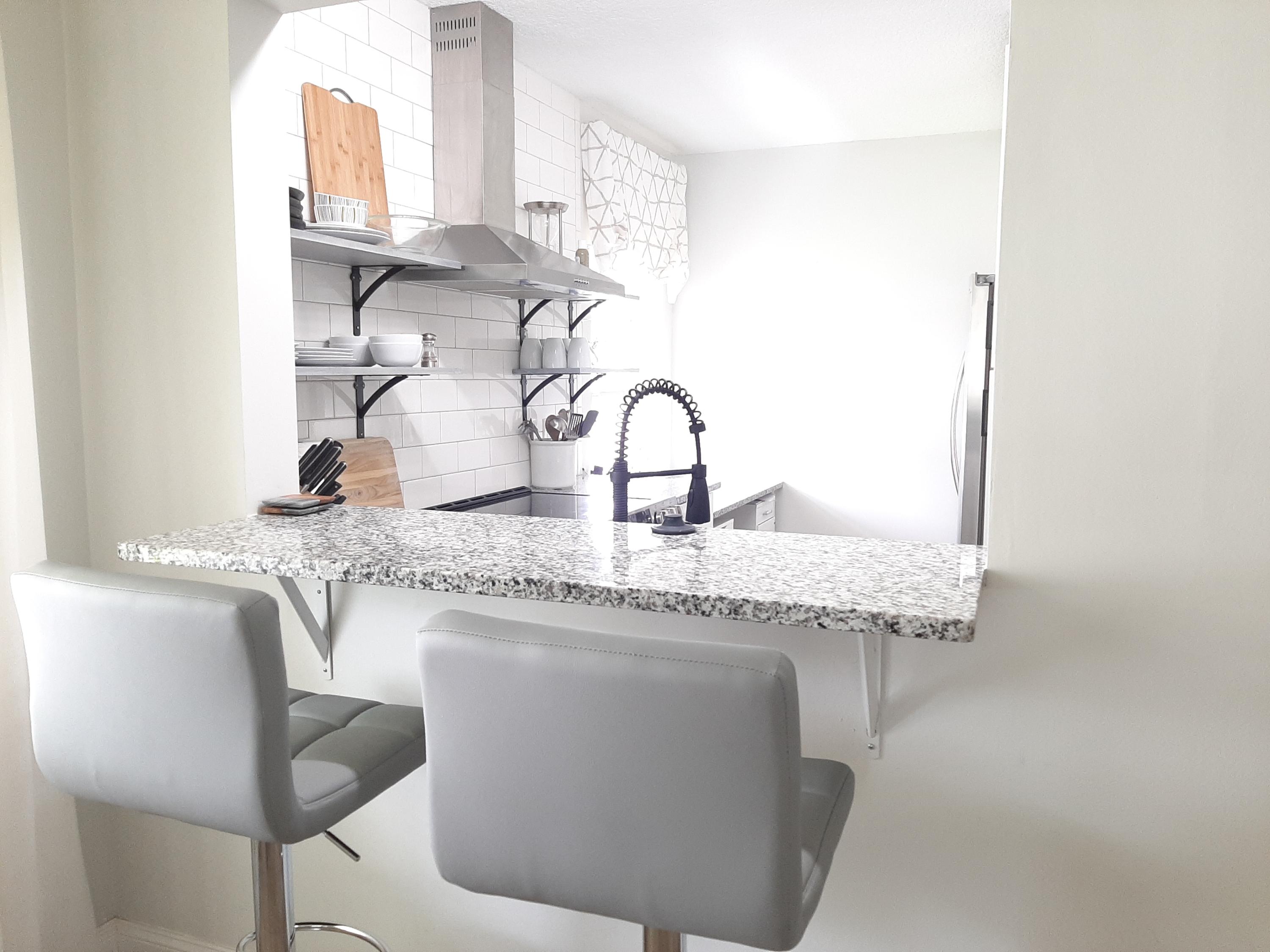 2820 Southwest 22nd Avenue, Unit 202 Delray Beach, FL 33445 - Photo 10 of 49 Breakfast Bar