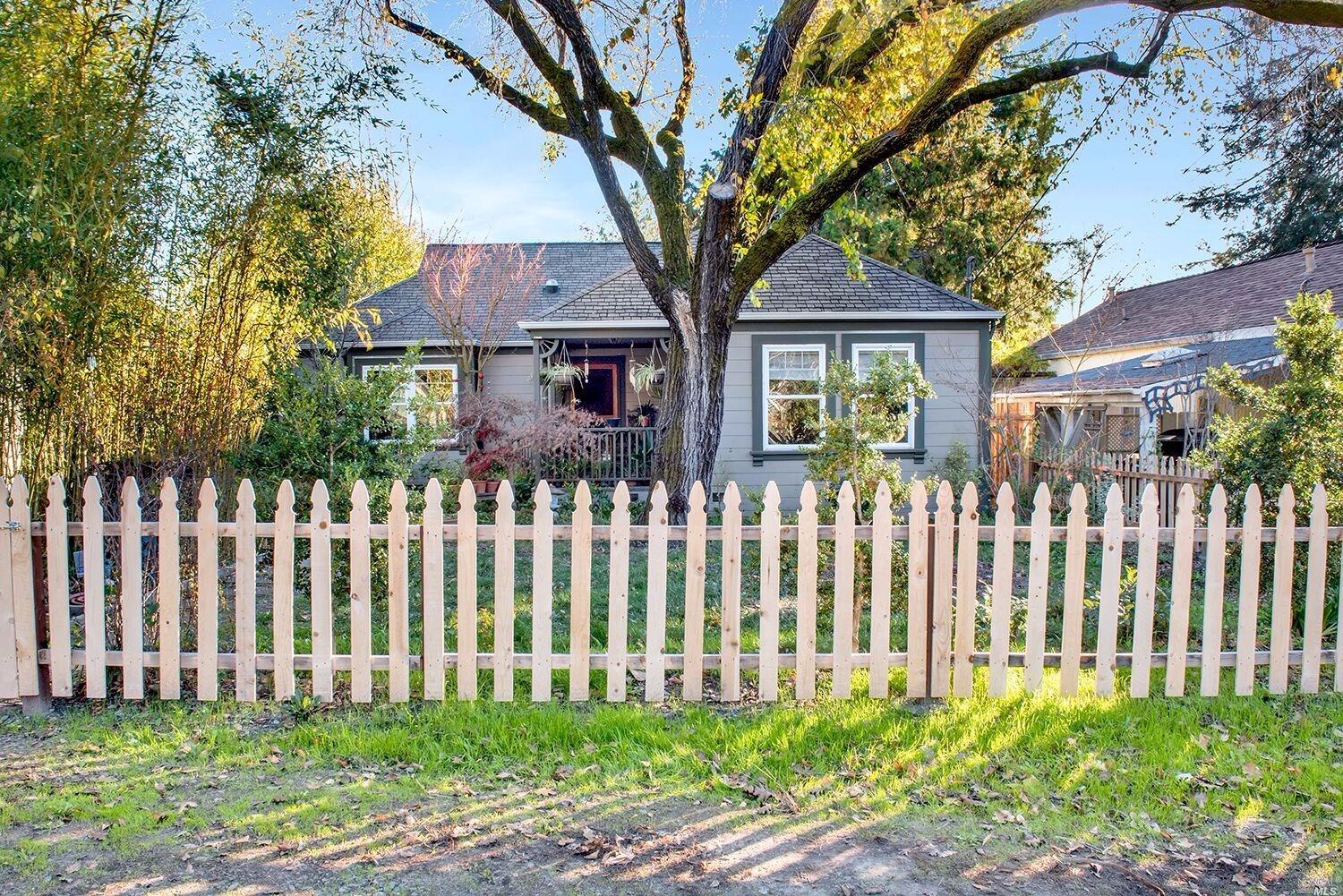 8955 Graton Road Graton, CA 95444 - Photo 1 of 1 a front view of a house with a garden