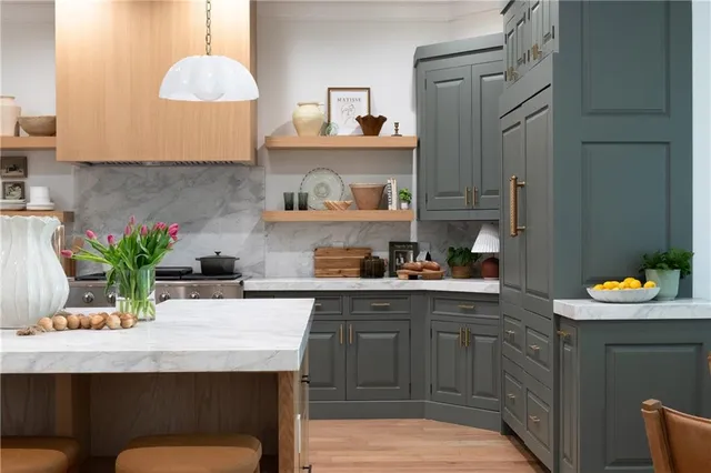 a bathroom with a double vanity sink and mirror