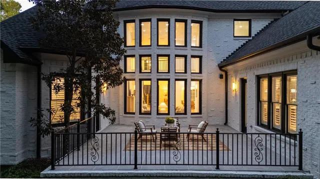 a bathroom with a granite countertop sink mirror and double